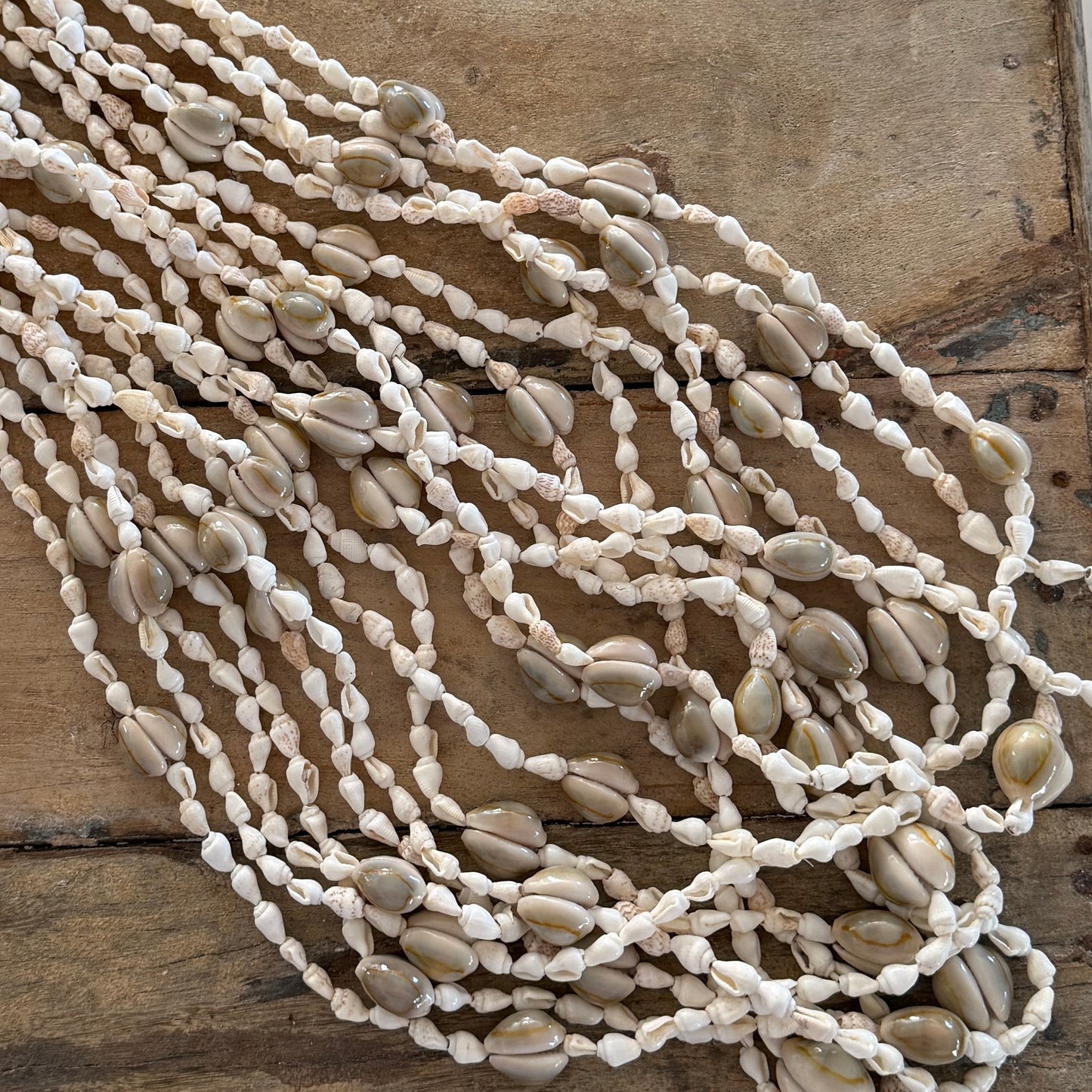 Cantik Cowrie & Small White Shells Necklace | Tassel | Lei